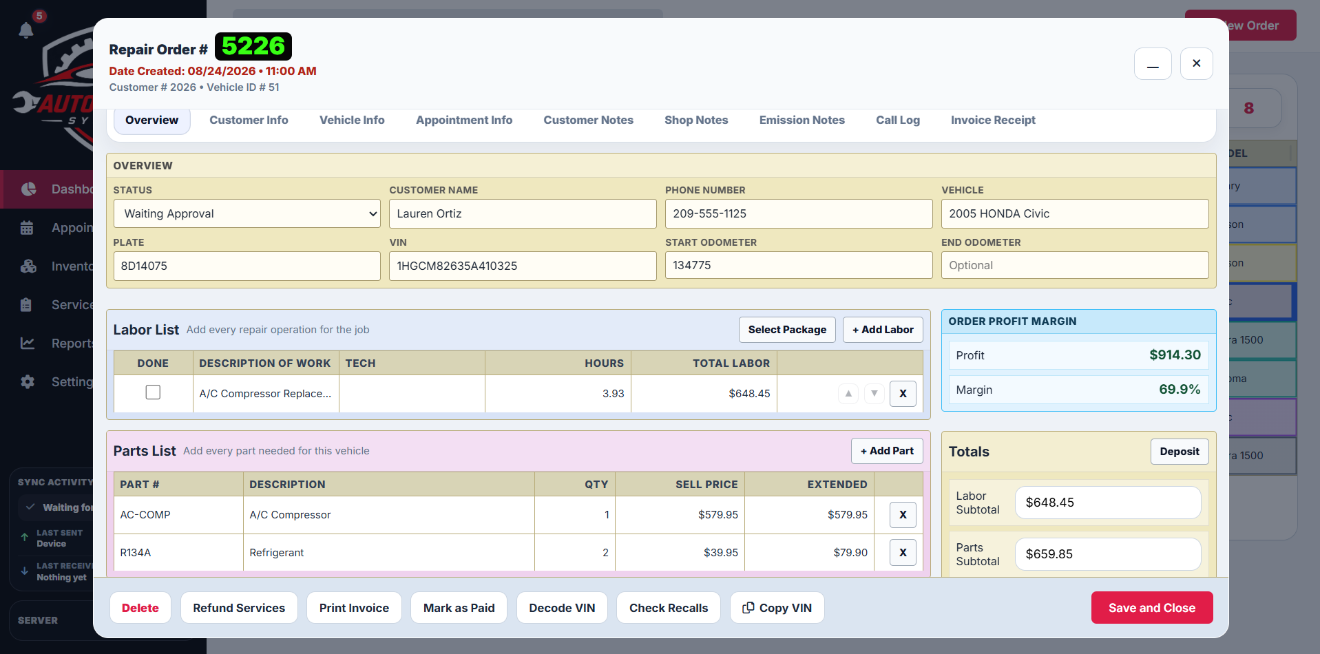 Auto Repair System repair order workspace with labor, parts, profit margin, and totals